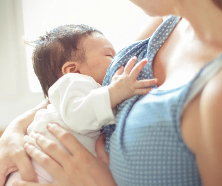 mom feeding baby